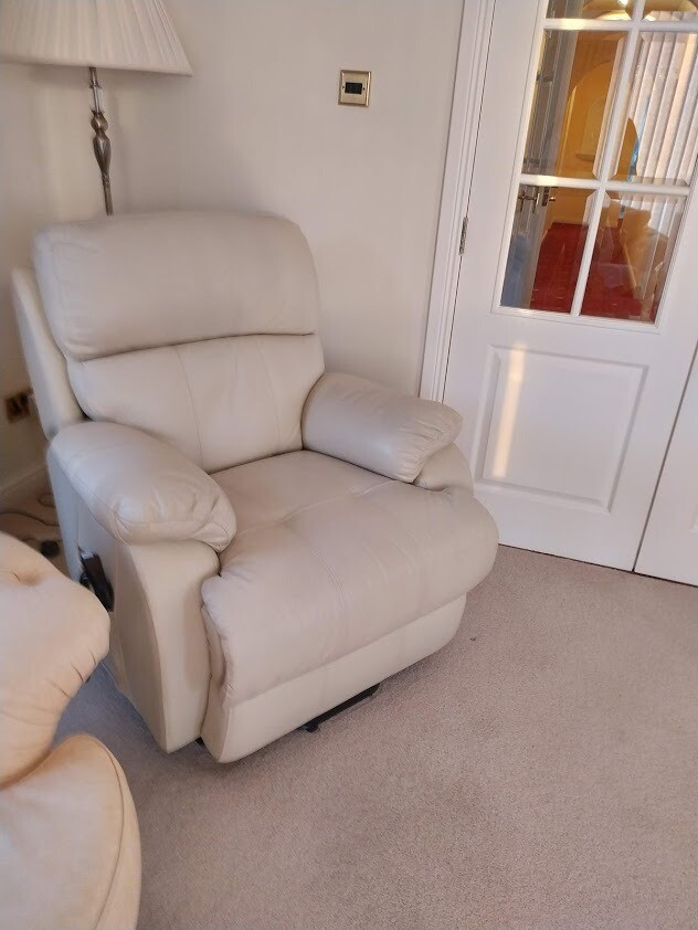 Cream leather riserrecliner chair (Sterling furniture) in Sauchie