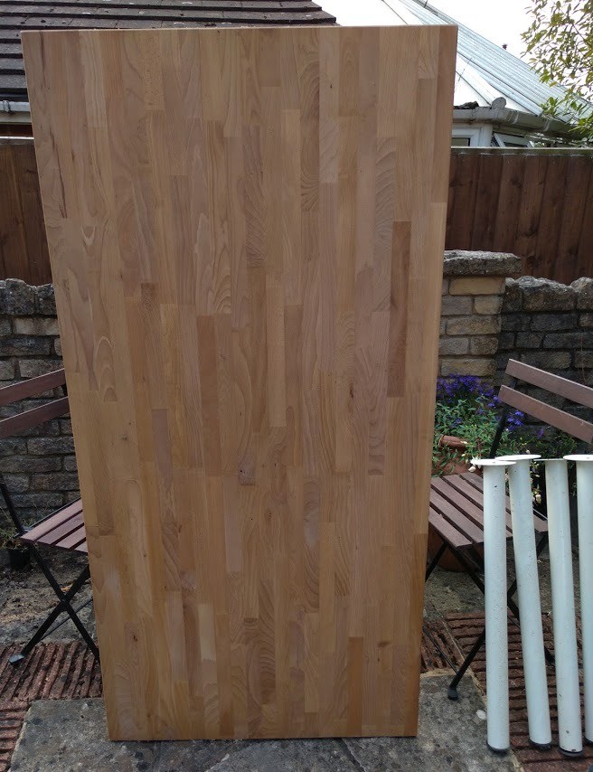Ikea solid wood table top and four detachable legs in Alresford