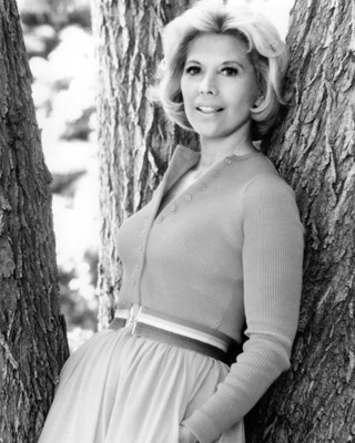 dinah shore 8x10 photo leaning against tree
