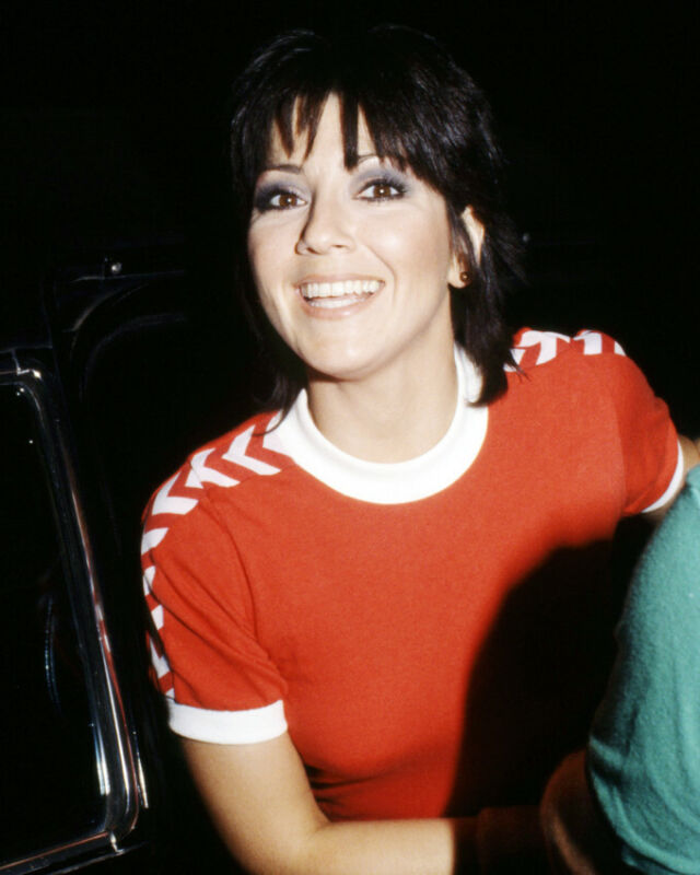 JOYCE DEWITT 8X10 PHOTO CANDID IN RED TOP SMILING CIRCA 1980