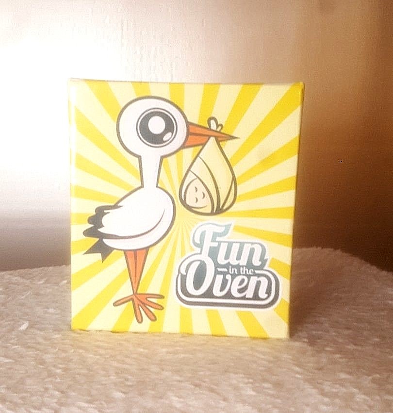 Baby shower Game FUN IN THE OVEN is a question and answer card game.