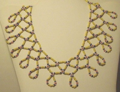 Handmade tiny gold beaded  bib necklace colors of yellow,blue,coral & white
