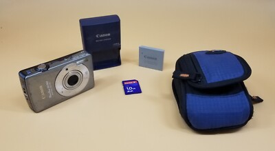 Canon PowerShot ELPH SD750 7.1MP Digital Camera Bat, Charger, Memory And Pouch