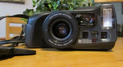 RICOH MIRAI ZOOM 35MM 35-105MM AUTO FOCUS CAMERA WITH STRAP & CAP NOT TESTED