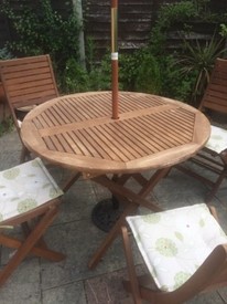 Round Black Glass top garden table and 4 chairs. | in Brentwood, Essex