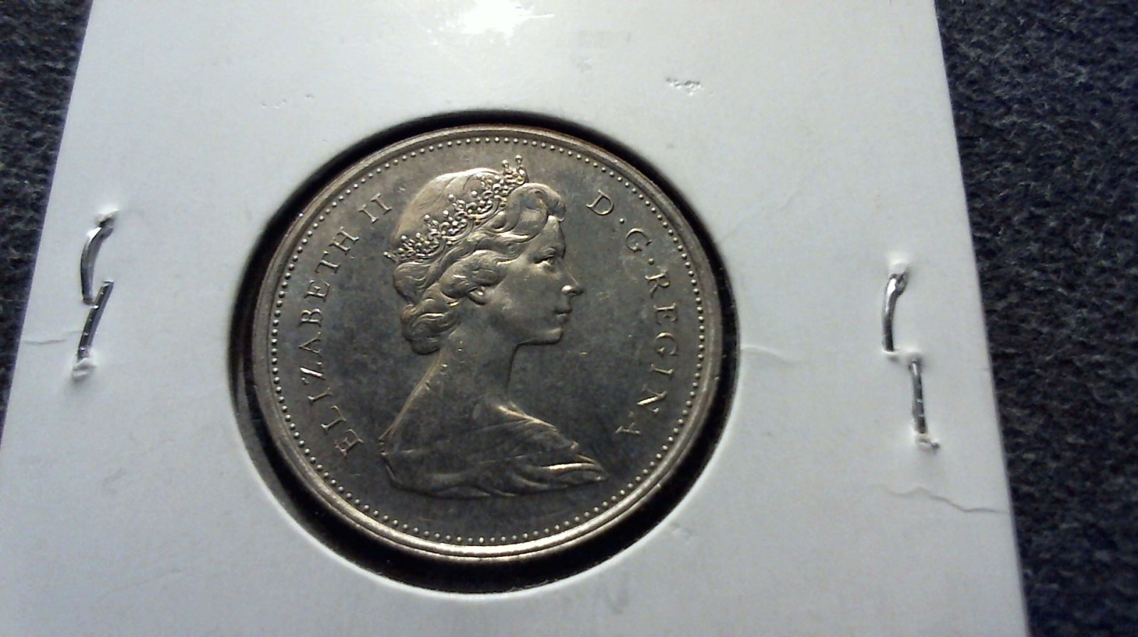 CAN 1974 25c piece in 2 x 2 holder unc semi-rare