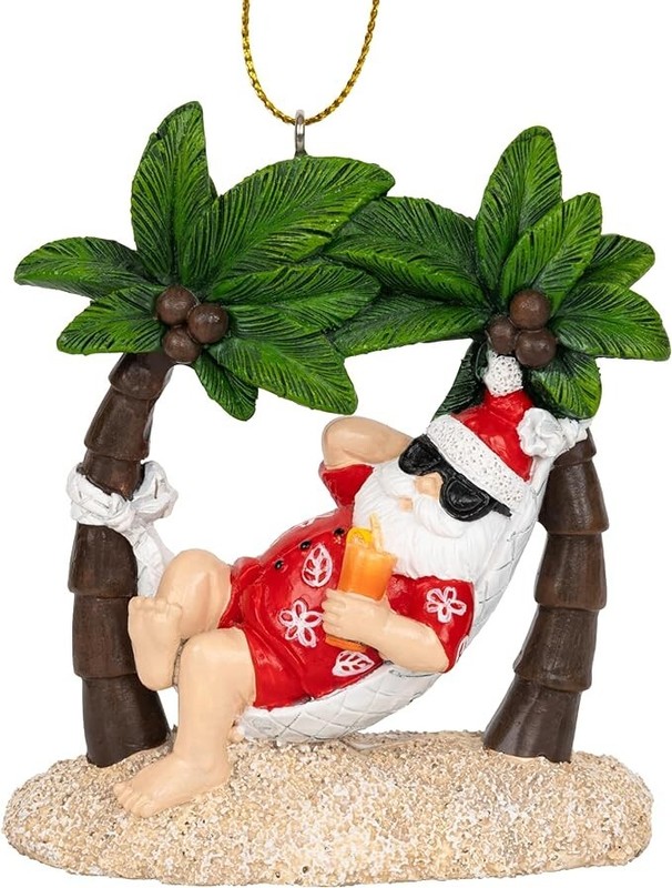 Santa Relaxing On The Beach On A Hammock Under Palm