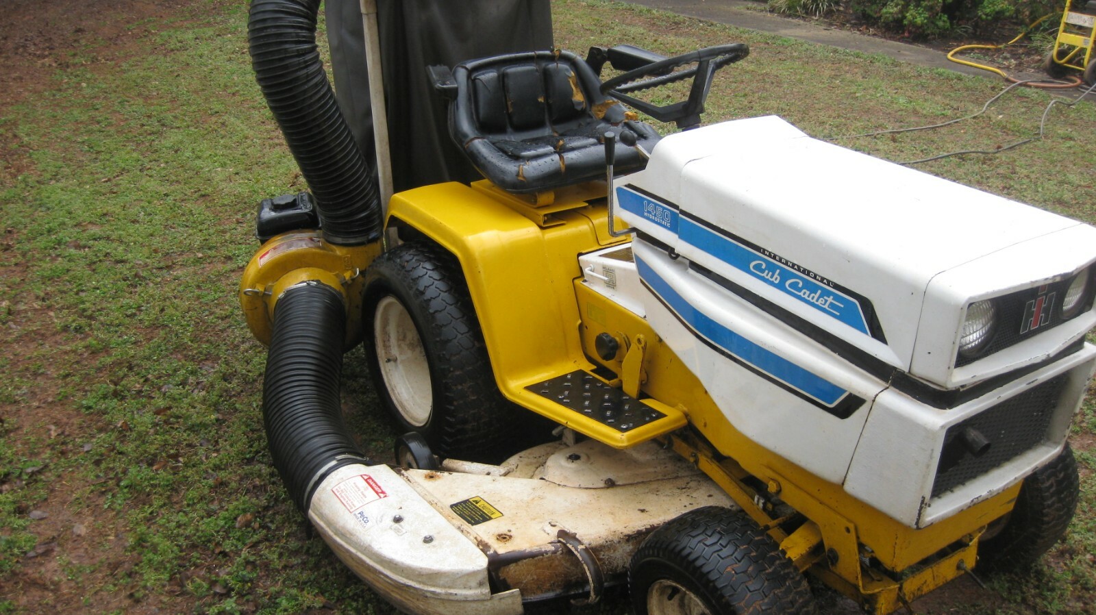 International Harvester Cub Cadet Quiet-line 1450 Tractor with Peco Leaf Vacuum