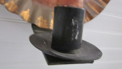Antique copper and iron wall candle sconce. Crimped around outside.