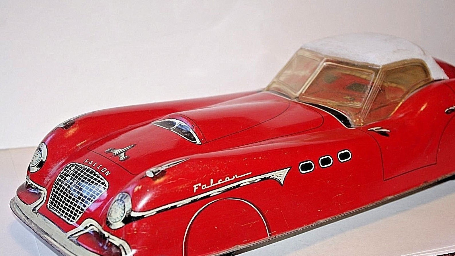 Vintage Marx 1950's Falcon Tin Litho Friction Car with cloth rag top  (Works)