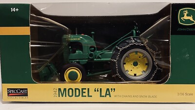 John Deere LA  Tractor  With Tire Chains And Snow Blade.   1/16 Scale NIB
