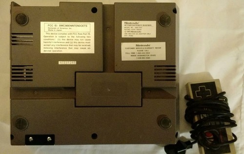 Nintendo NES Console NES-001 and one controller. NOT WORKING FOR PARTS or repair