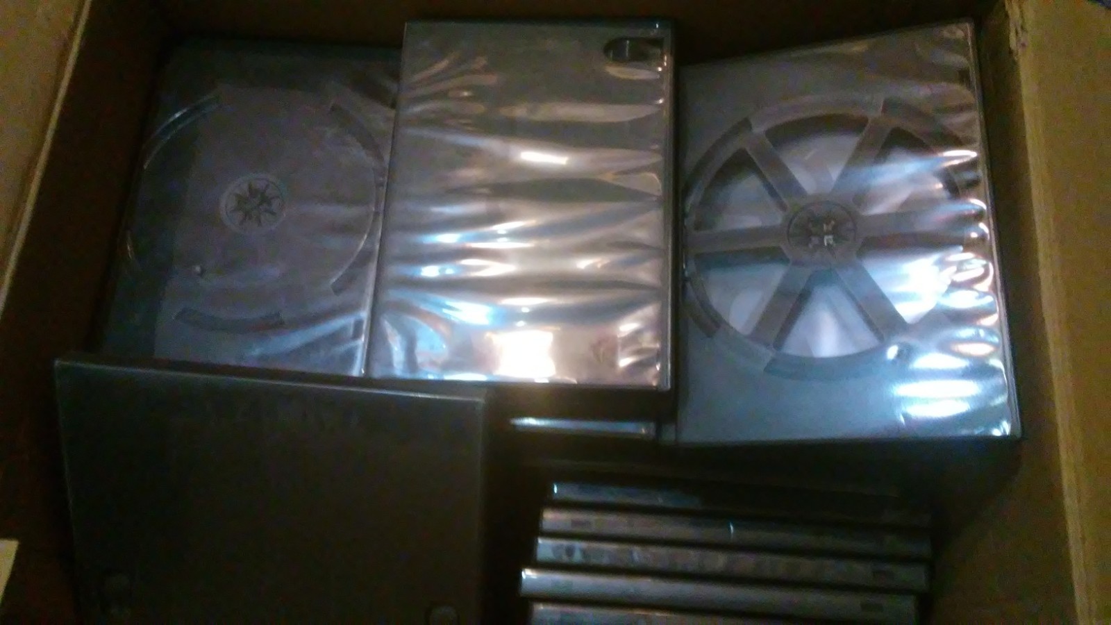 Lot of over 50 empty DVD cases. Hard Plastic.