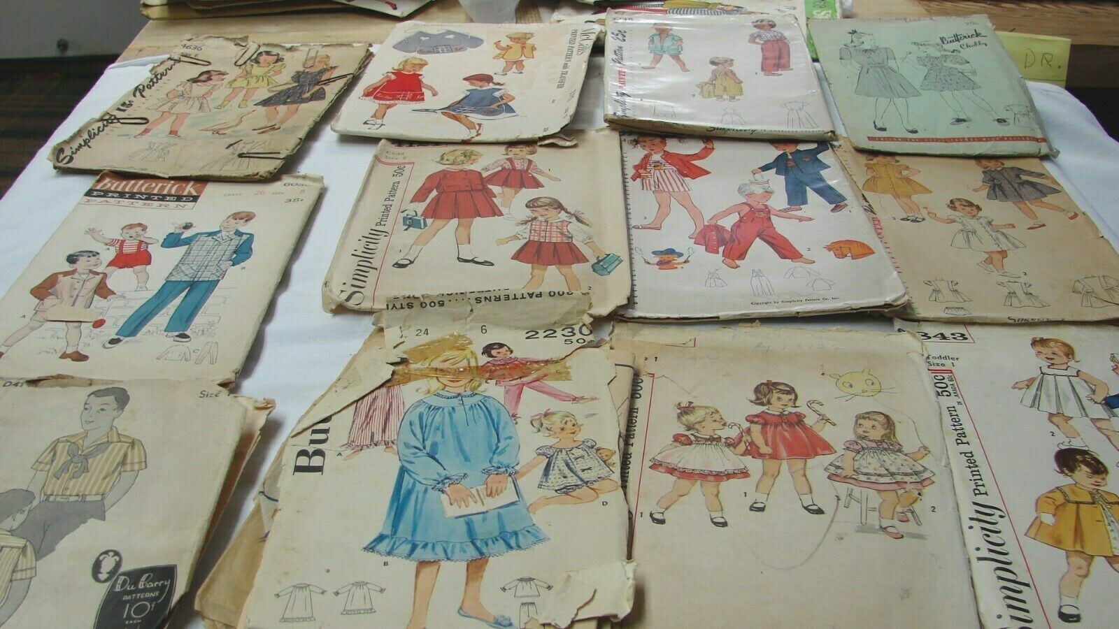 EARLY VINTAGE LOT 31 GIRLS BOYS CHILDRENS PATTERNS some NEW YORK, unopened
