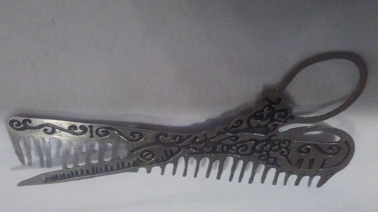 Hair dresser scissor pin