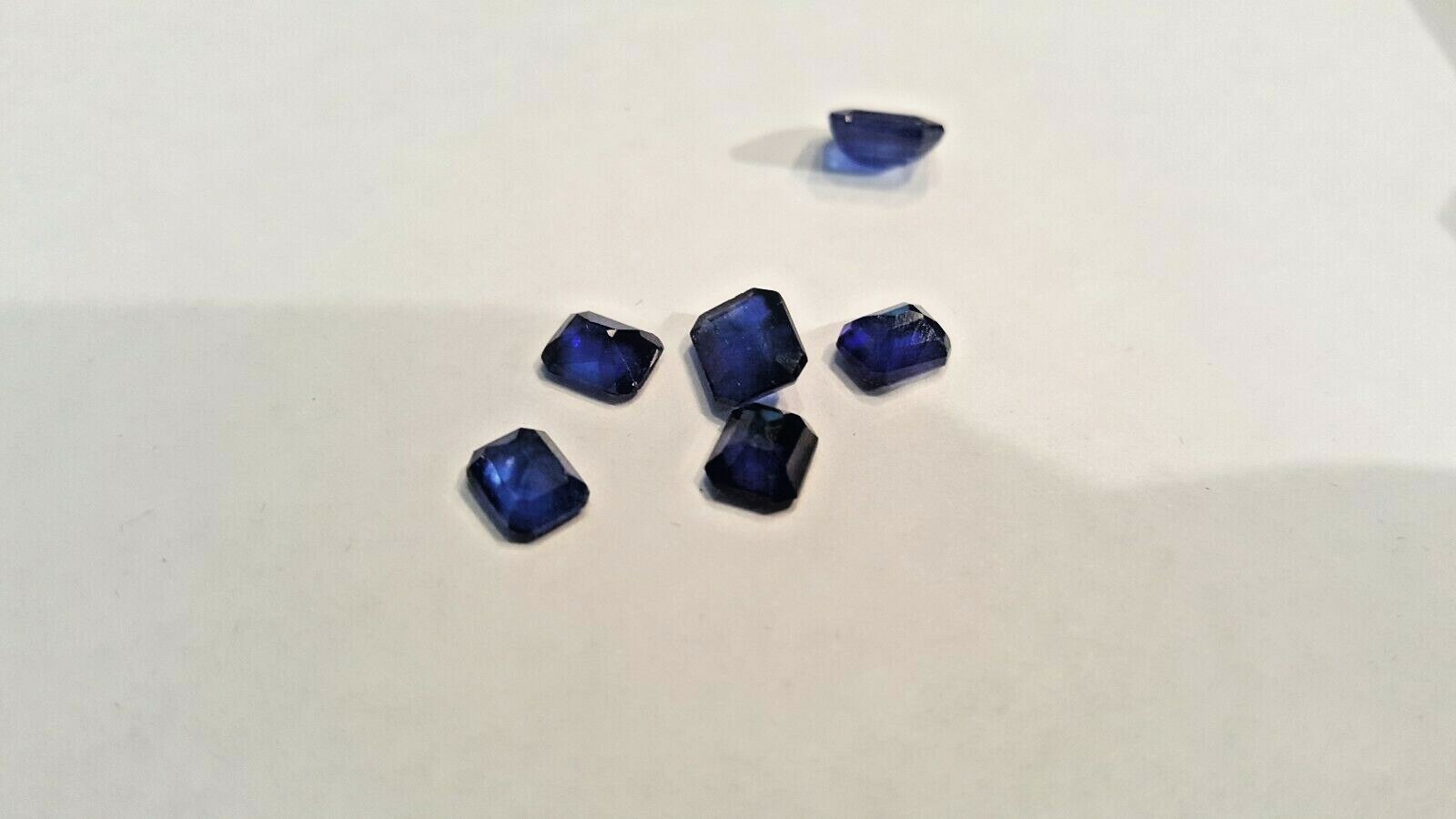 7.12 CARATS OF NATURAL BLUE SAPPHIRES  6 LARGE STONES 4.7MM TO 6.1MM