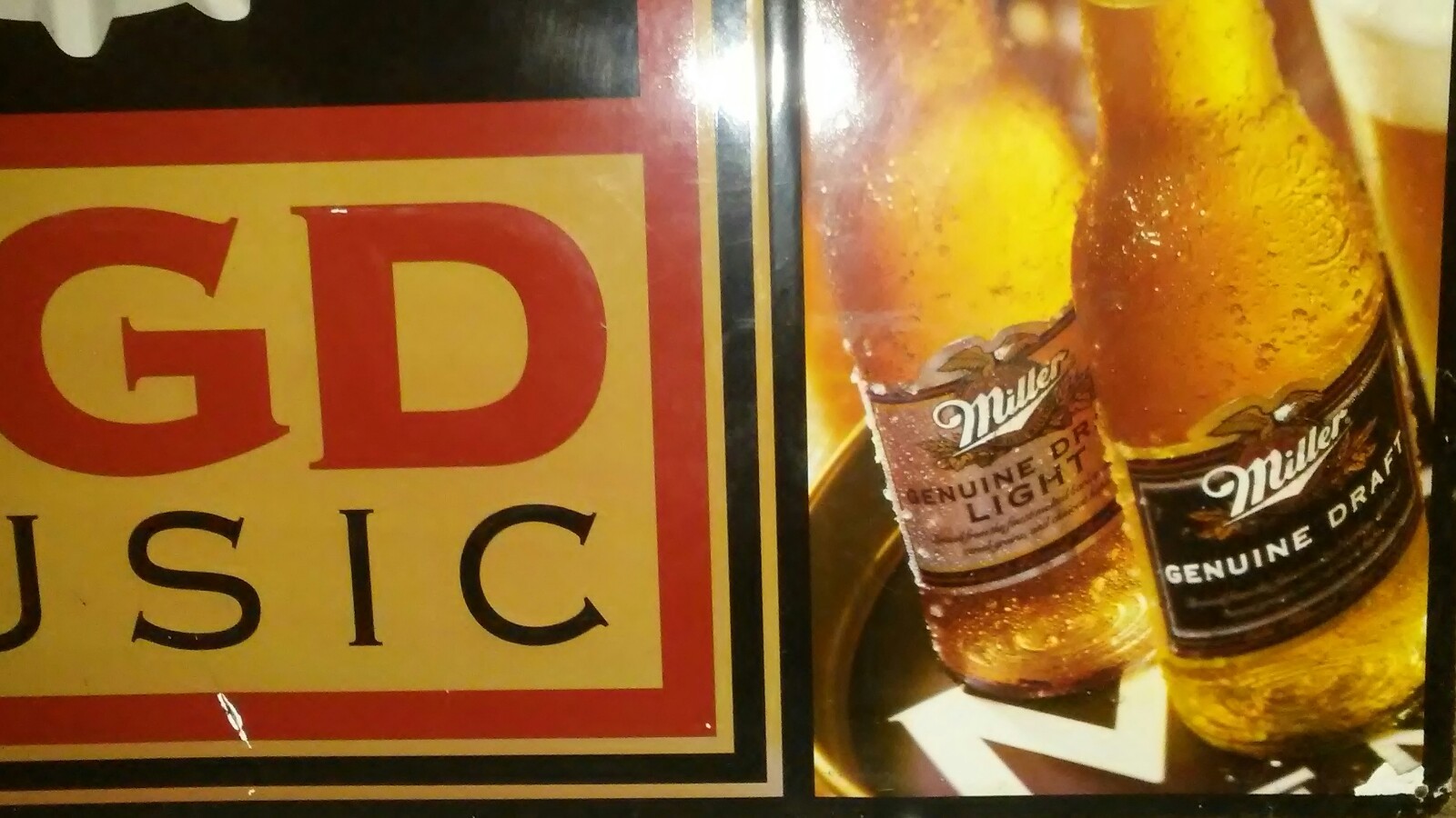 MILLER GENUINE DRAFT BEER EMBOSSED METAL TIN BEER SIGN  35 1/2 X 35 1/2 PREOWNED