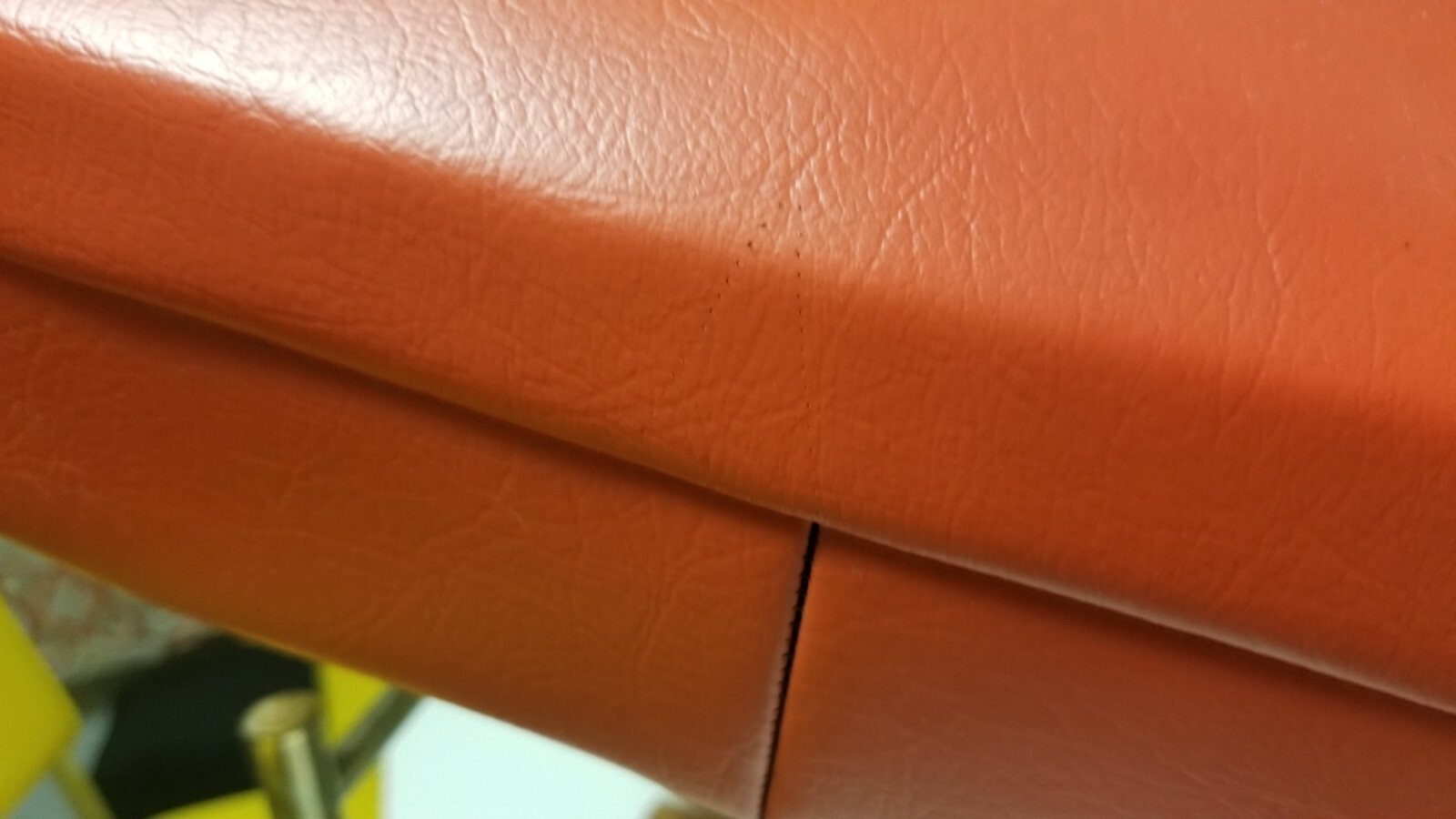 MID-CENTURY ORANGE VINYL ADJUSTABLE HASSOCK FOOT STOOL CRAWFORD MANUFACTURING CO