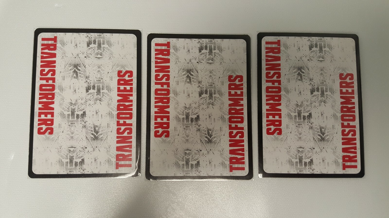 Transformers TCG x3 Cargo Trailer R 012 (rare)