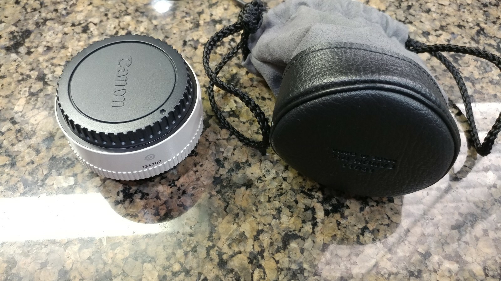 Canon Extender EF 1.4x II Mint condition.  Pouch and end caps included.