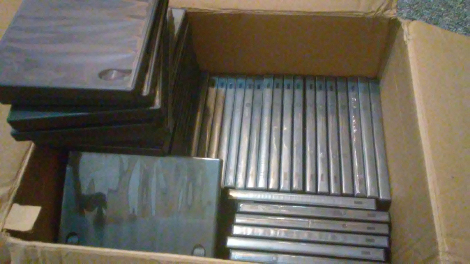 Lot of over 50 empty DVD cases. Hard Plastic.