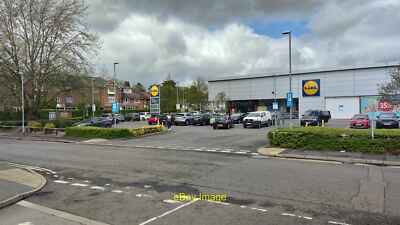 Photo 12x8 Lidl supermarket Wokingham Car park entrance from Ashville Way. c2021