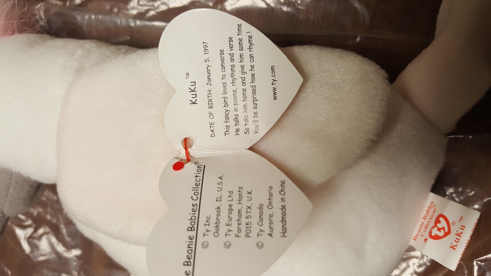 RARE -TY Beanie Baby kuku new with ORIGINAL Tages.