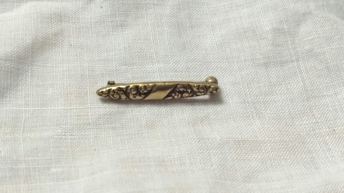 Antique Victorian tiny brass repousse bar pin. C clasp