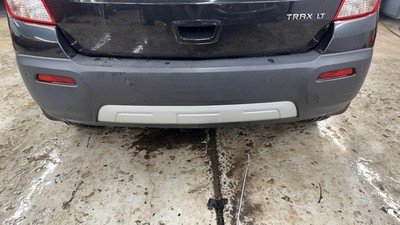 Used Rear Bumper Assembly Rear fits: 2015 Chevrolet Trax w/silver fascia insert