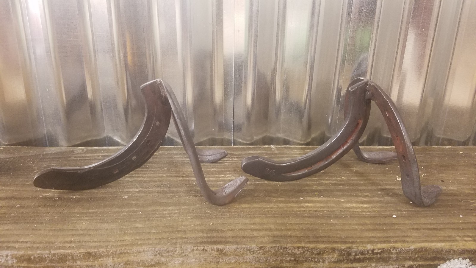 Mr. and Mrs. sign with hand forged horseshoe sign holders