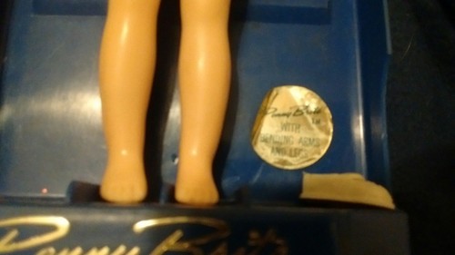 Penny Brite in red dress blue case vintage