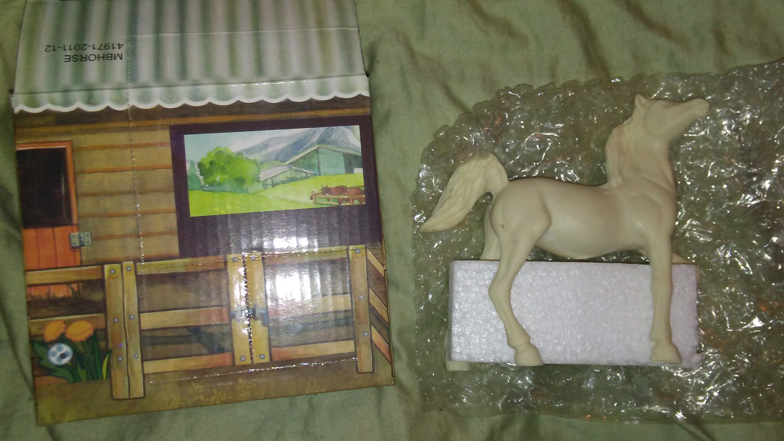 three porcelain horses to paint new in boxes