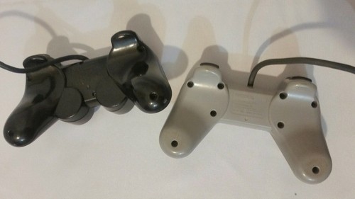 2 Playstation Controllers Lot / 1 black dual shock 2  Tested and working