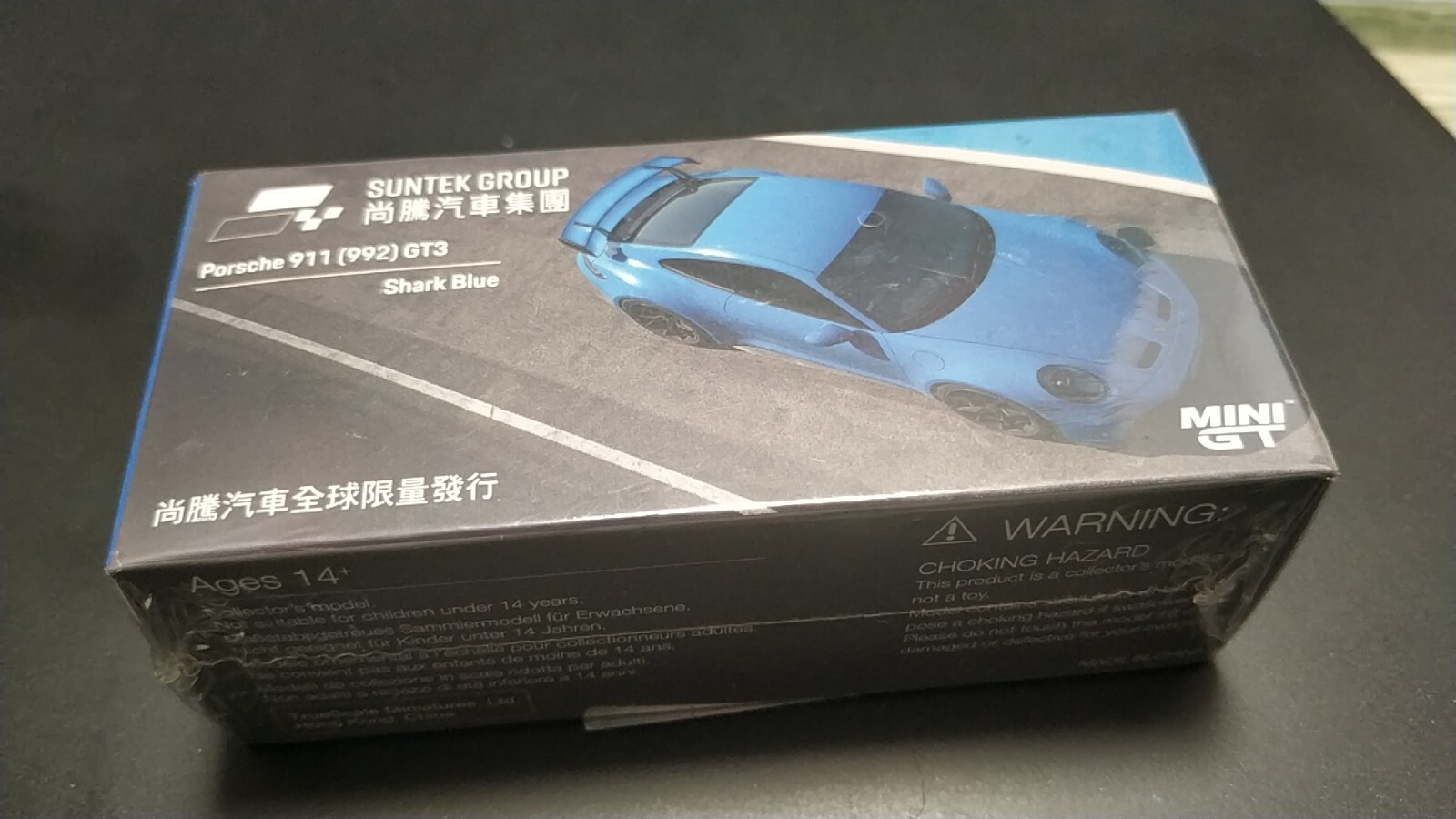 MINI GT Porsche 911 (992) GT3 Shark Blue SUNTEK Group ST002