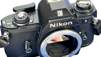Nikon EM 35mm SLR Film Camera Black Body Only Winds Auto M90 ASA