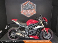 2016 Triumph Street Triple 675 ABS in red with 8818 miles.