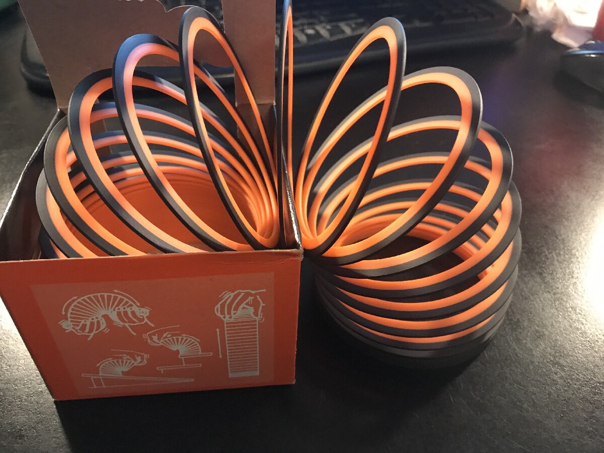 Original Halloween Orange Plastic Slinky 2010 NEW IN BOX Rare FUN Toy Spooky!