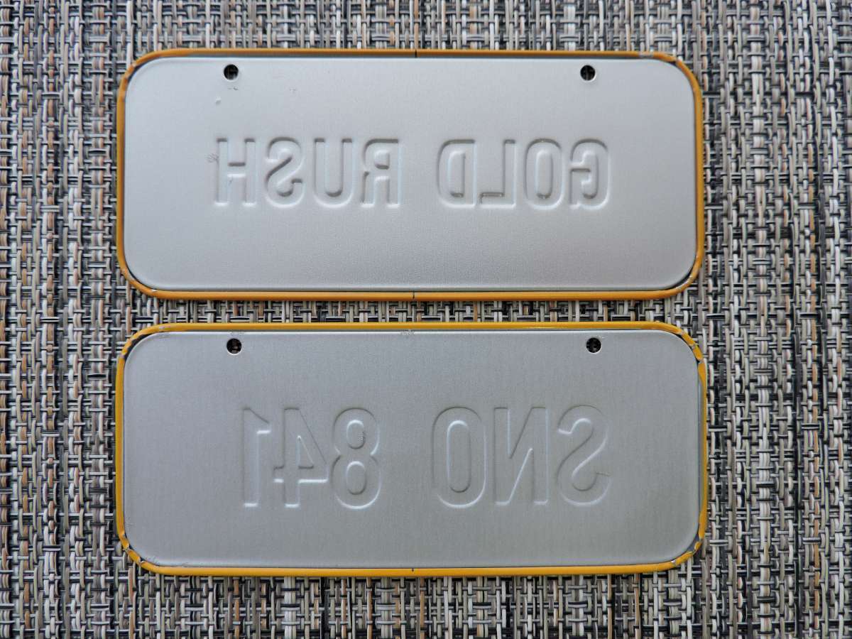 1980s Alaska Mini Vintage Post Cereal Bicycle License Plates SNO 841 / Gold Rush
