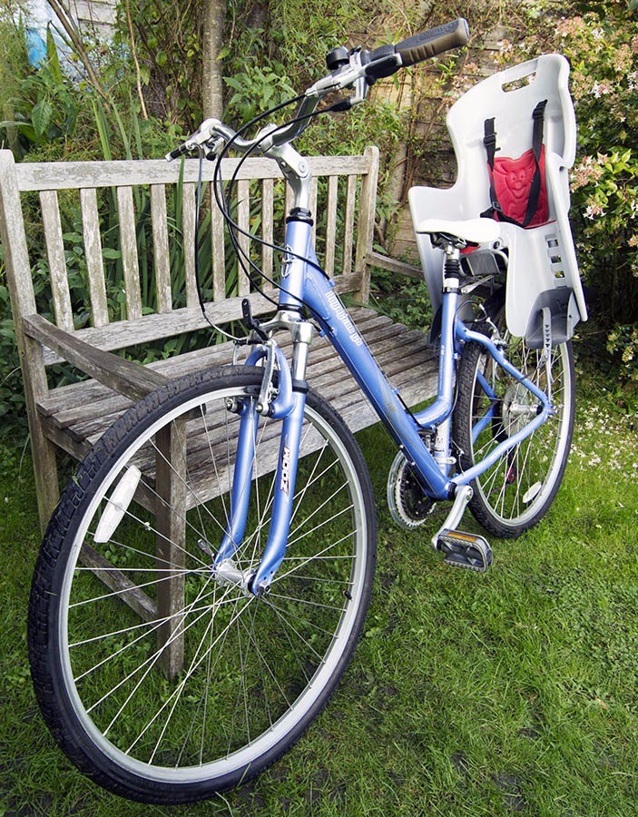 Ladies style bike with child seat, excellent condition in Guildford