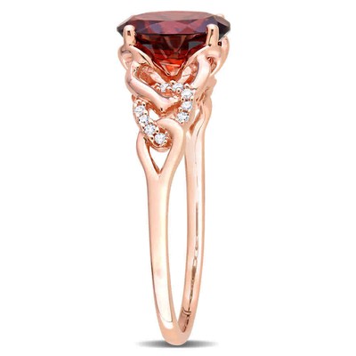 Pre-owned Amour 1 3/8 Ct Tgw Oval Garnet And Diamond Accent Link Ring In 10k Rose Gold In Pink