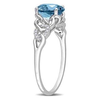 Pre-owned Amour 1 5/8 Ct Tgw Oval London Blue Topaz And Diamond Accent Link Ring In 10k In White