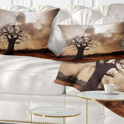 Designart 'Large Baobab Tree under Clouds' Modern Landscape