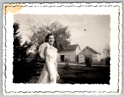 Vtg B&W Snapshot Pretty Young Woman In White Ruffle Dress By Farm Barn 1940s