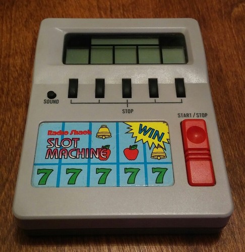 Radio Shack Slot Machine vintage LCD Mini handheld electronic game 60-2464 WORKS