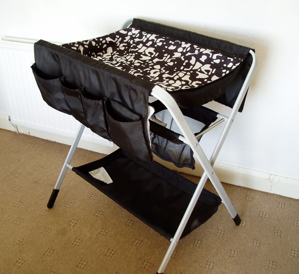 Ikea folding changing table with mat and matcovers in Morecambe