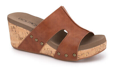 Corky's Women's Oasis Wedge Slip-on in Black and Cognac