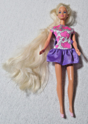 Rapunzel barbie doll value hotsell