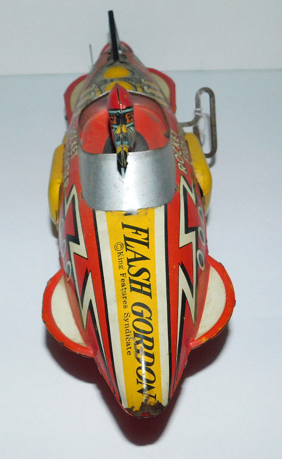 VINTAGE MARX WINDUP FLASH GORDON TIN ROCKET FIGHTER SIGNED BY BUSTER CRABBE