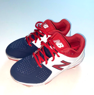 New balance red on sale white and blue cleats