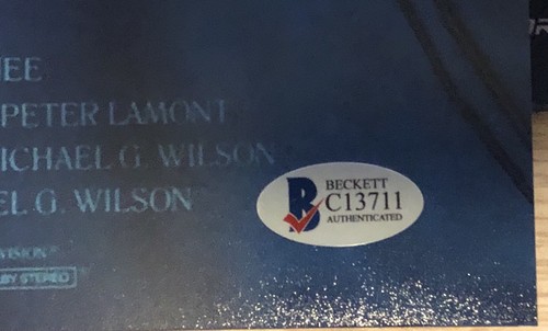 Roger Moore signed A View to A Kill 11X17 mini movie poster - BAS STICKER ONLY